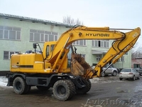 ХЮНДАЙ-1400W, 75000$ 2003г.в., колесный экскаватор , ковш 0,71 м.куб., отвал  - Изображение #1, Объявление #242764