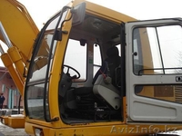 ХЮНДАЙ-1400W, 75000$ 2003г.в., колесный экскаватор , ковш 0,71 м.куб., отвал  - Изображение #5, Объявление #242764