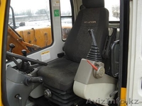 ХЮНДАЙ-1400W, 75000$ 2003г.в., колесный экскаватор , ковш 0,71 м.куб., отвал  - Изображение #6, Объявление #242764