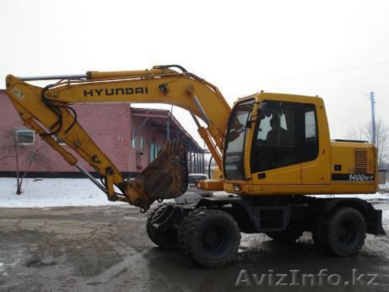 ХЮНДАЙ-1400W, 75000$ 2003г.в., колесный экскаватор , ковш 0,71 м.куб., отвал  - Изображение #2, Объявление #242764