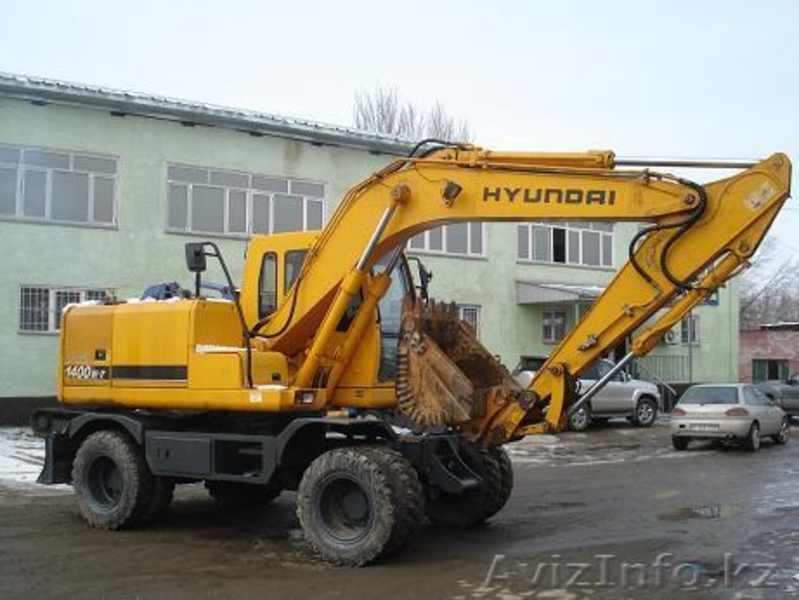 ХЮНДАЙ-1400W, 75000$ 2003г.в., колесный экскаватор , ковш 0,71 м.куб., отвал  - Изображение #1, Объявление #242764