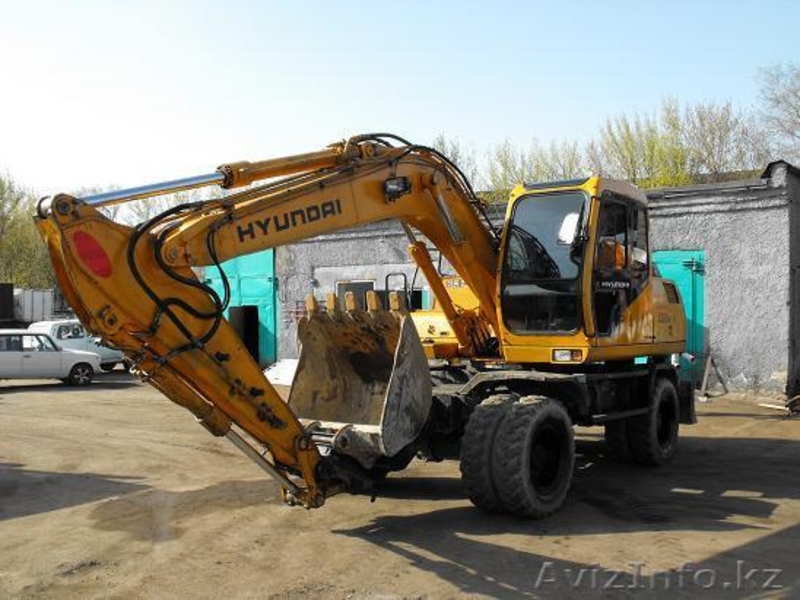 HYUNDAI -1300W, 65000$ 2003г.в.,колесный экскаватор , ковш 0,71 м.куб.,отвал - Изображение #2, Объявление #242741
